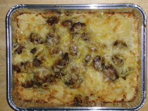 essen_20091202_2 Champignongratin mit Erbsen, Kartoffelscheiben und Käse überbacken