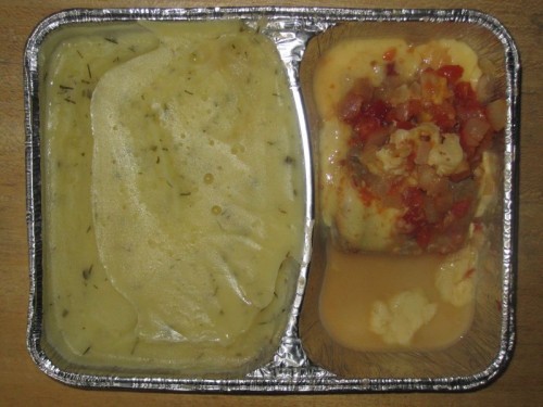 Gebackenes Fischfilet mit Tomate und Käse überbacken an Kartoffelpüree