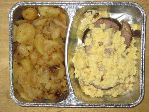 Kasslersteak "Prager Art" mit Schinkenrührei und Bratkartoffeln